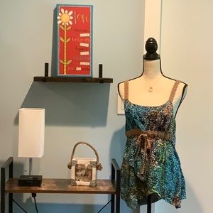 Santiki asymmetrical rayon camisole with roped trim.